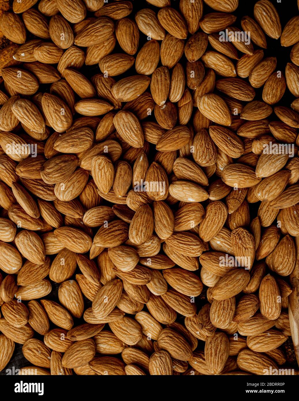 almond wallpaper dried almonds with skin Stock Photo Alamy