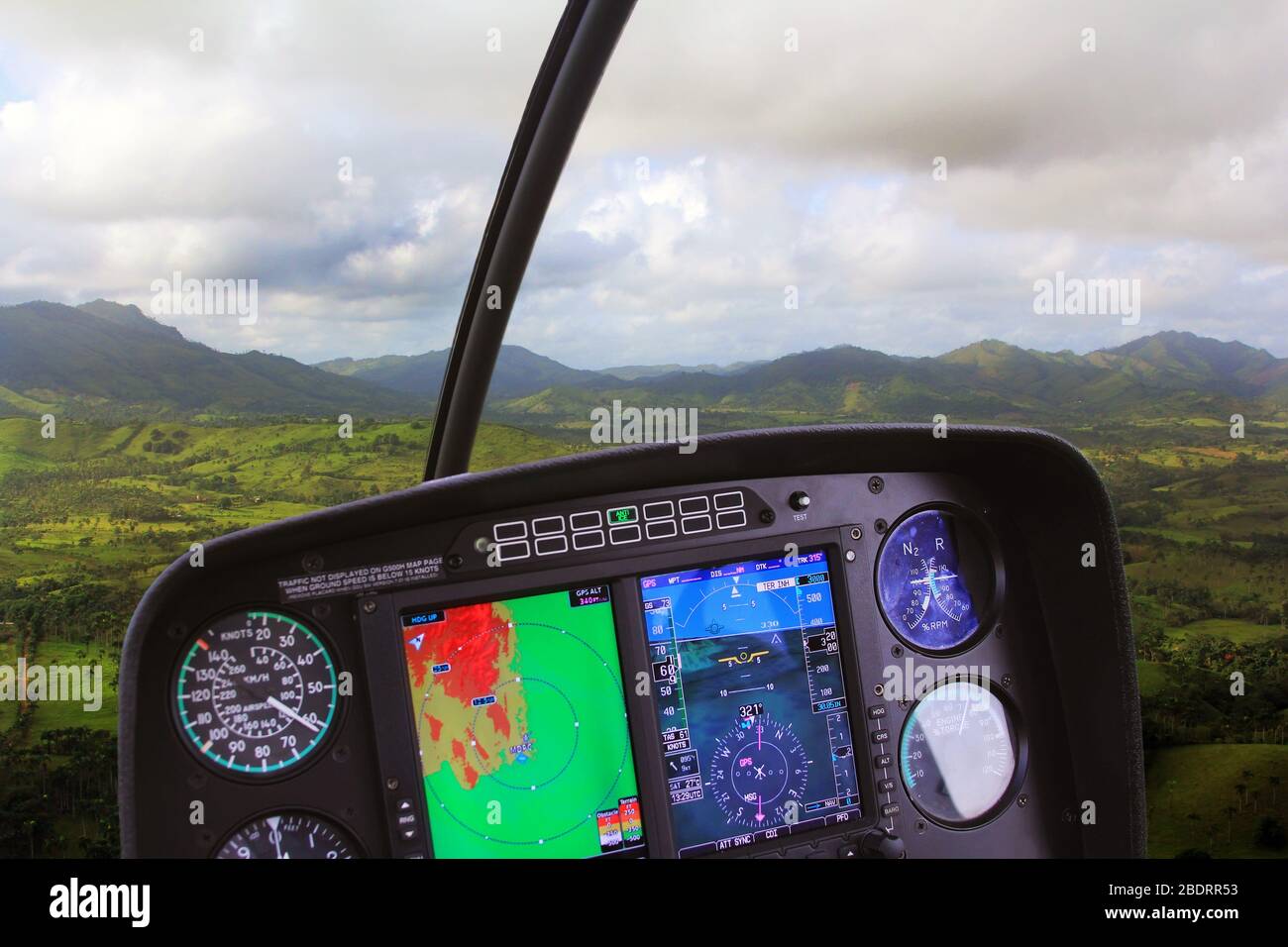 Control display in a helicopter with a view of the coldiers in the Dominican Republic. Stock Photo