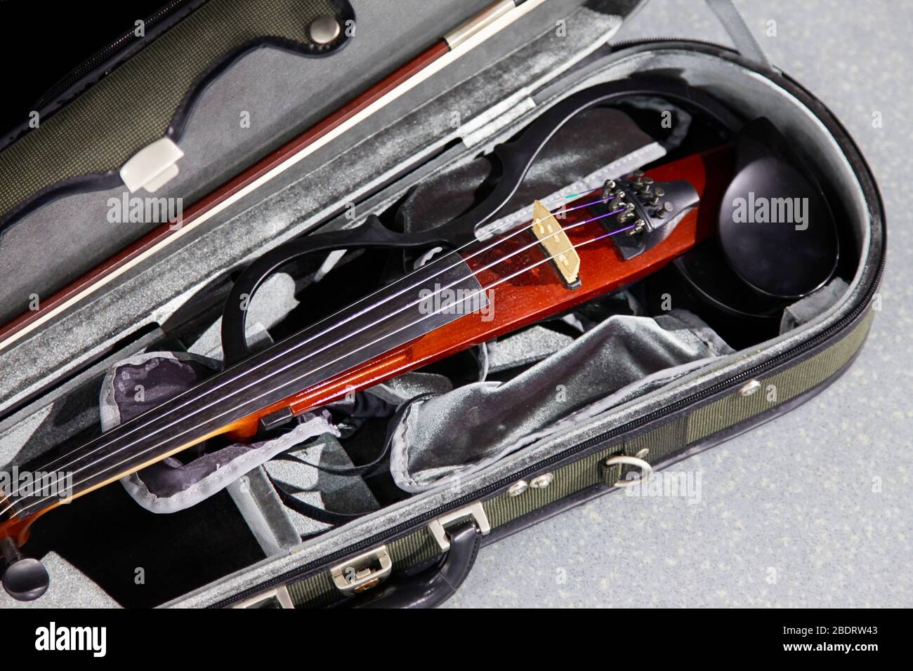 Electric violin in a case Stock Photo