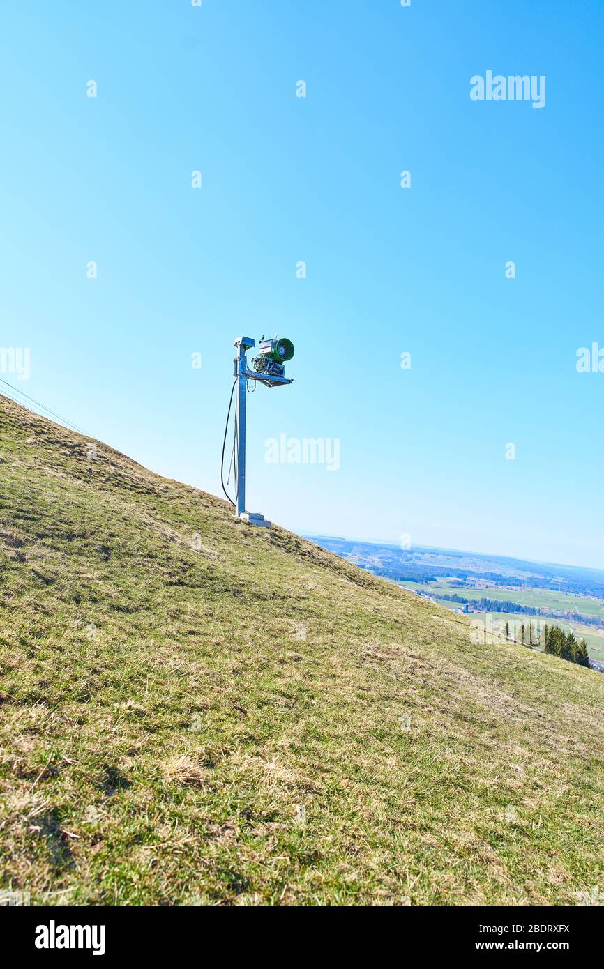Nesselwang, Germany, April 08, 2020. A snow cannon in spring time in the Alpspitzbahn ski arena   on April 08, 2020 in Nesselwang, Germany. © Peter Schatz / Alamy Live News Stock Photo