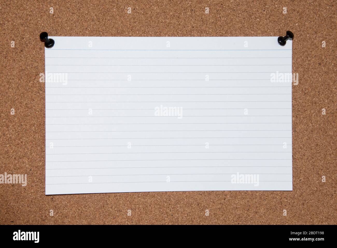 Cork board with tacks, white flash card Stock Photo Alamy
