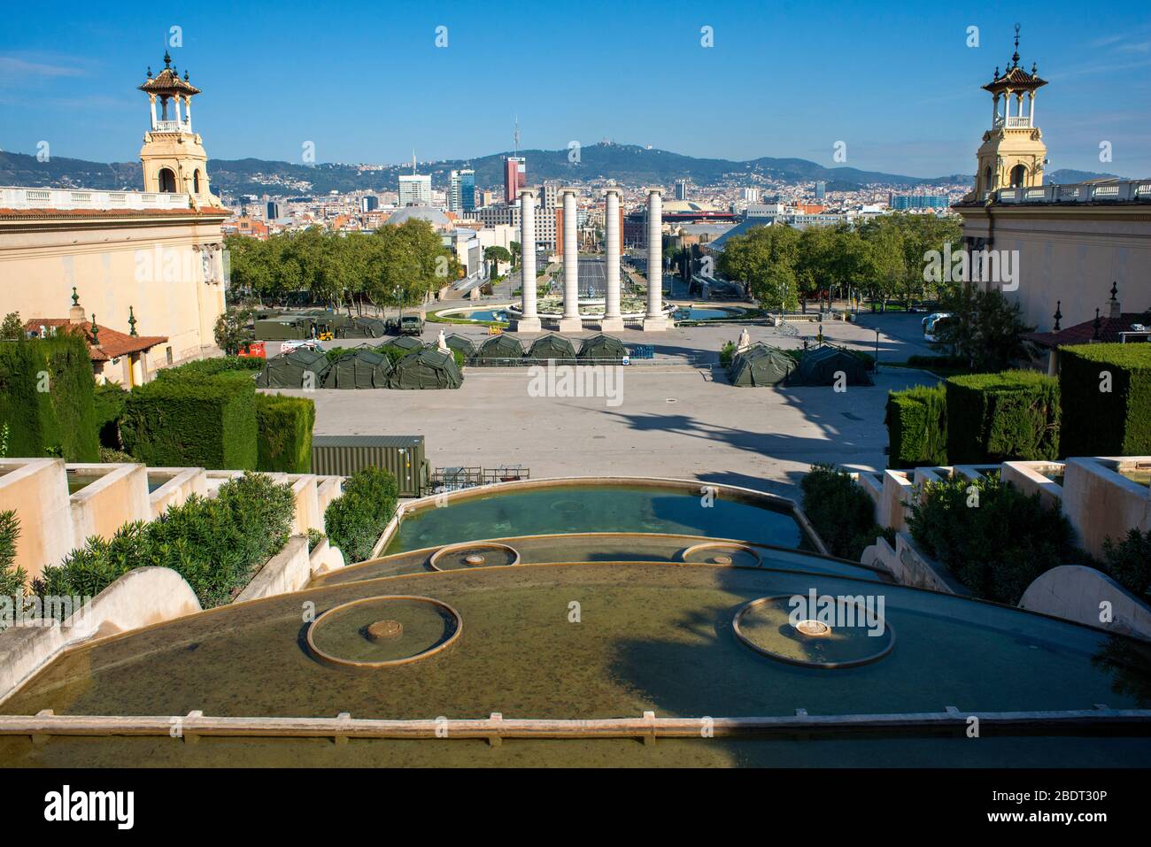 Congress palace in Monjuic, Barcelona, Spain.  Camp set up by the Spanish army to house homeless people. Spain is one of the countries most affected b Stock Photo