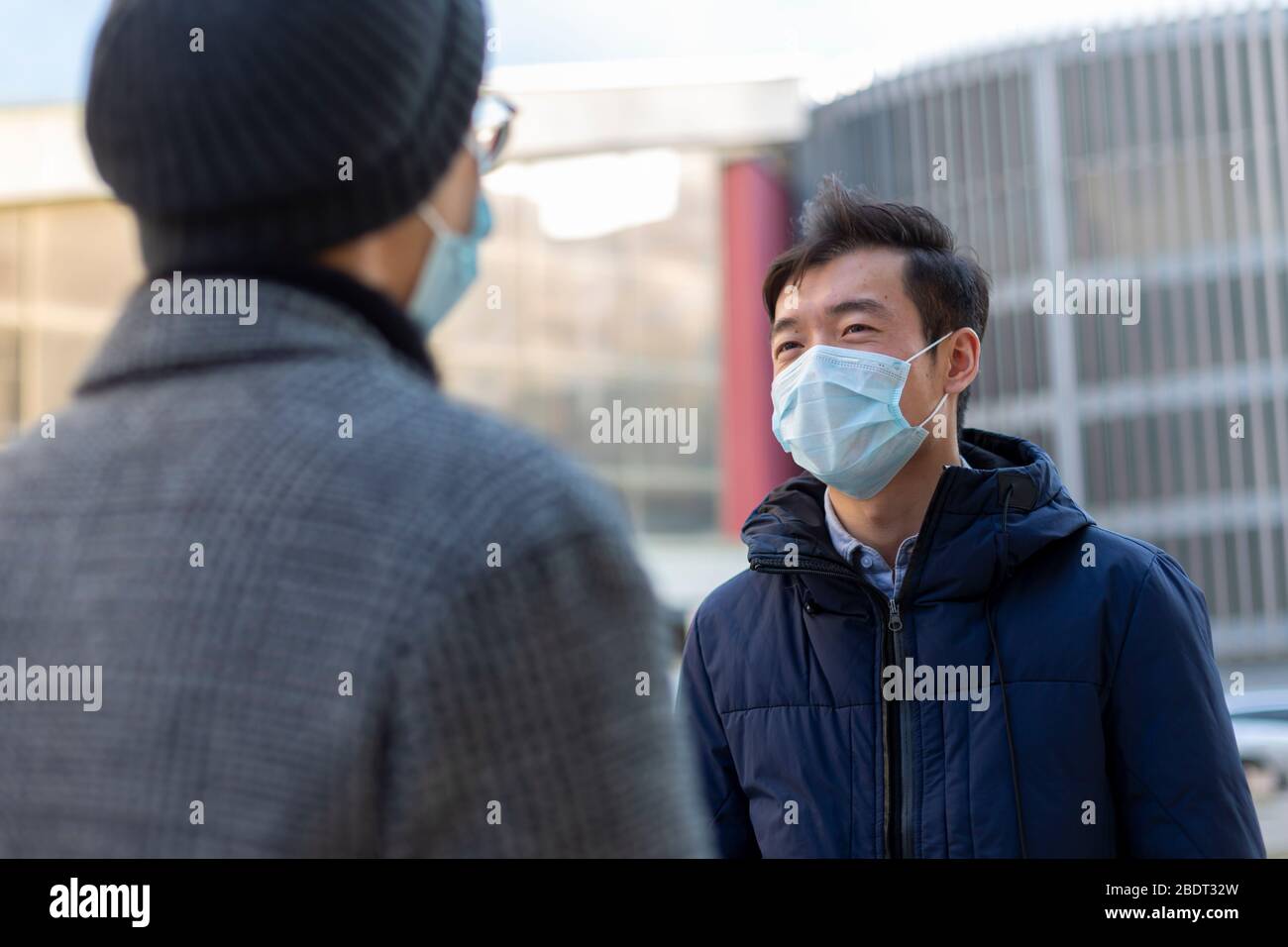 Two men in medical masks hi-res stock photography and images - Alamy