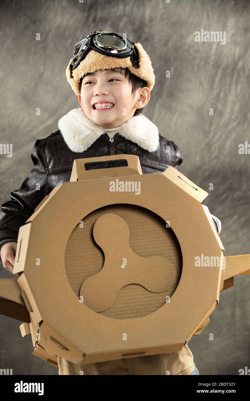 Happy children's driving paper airplanes Stock Photo - Alamy