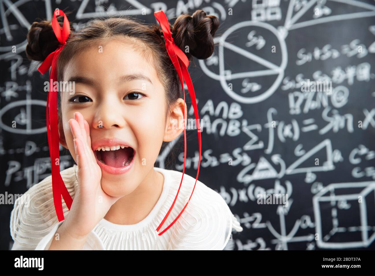 The blackboard which zha modelling of the little girl Stock Photo