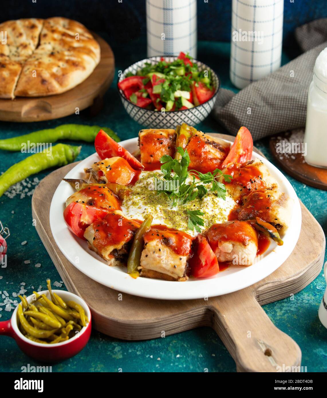 turkish dish beyti kebab with beef wrapped in flatbread served with tomato sauce Stock Photo Alamy