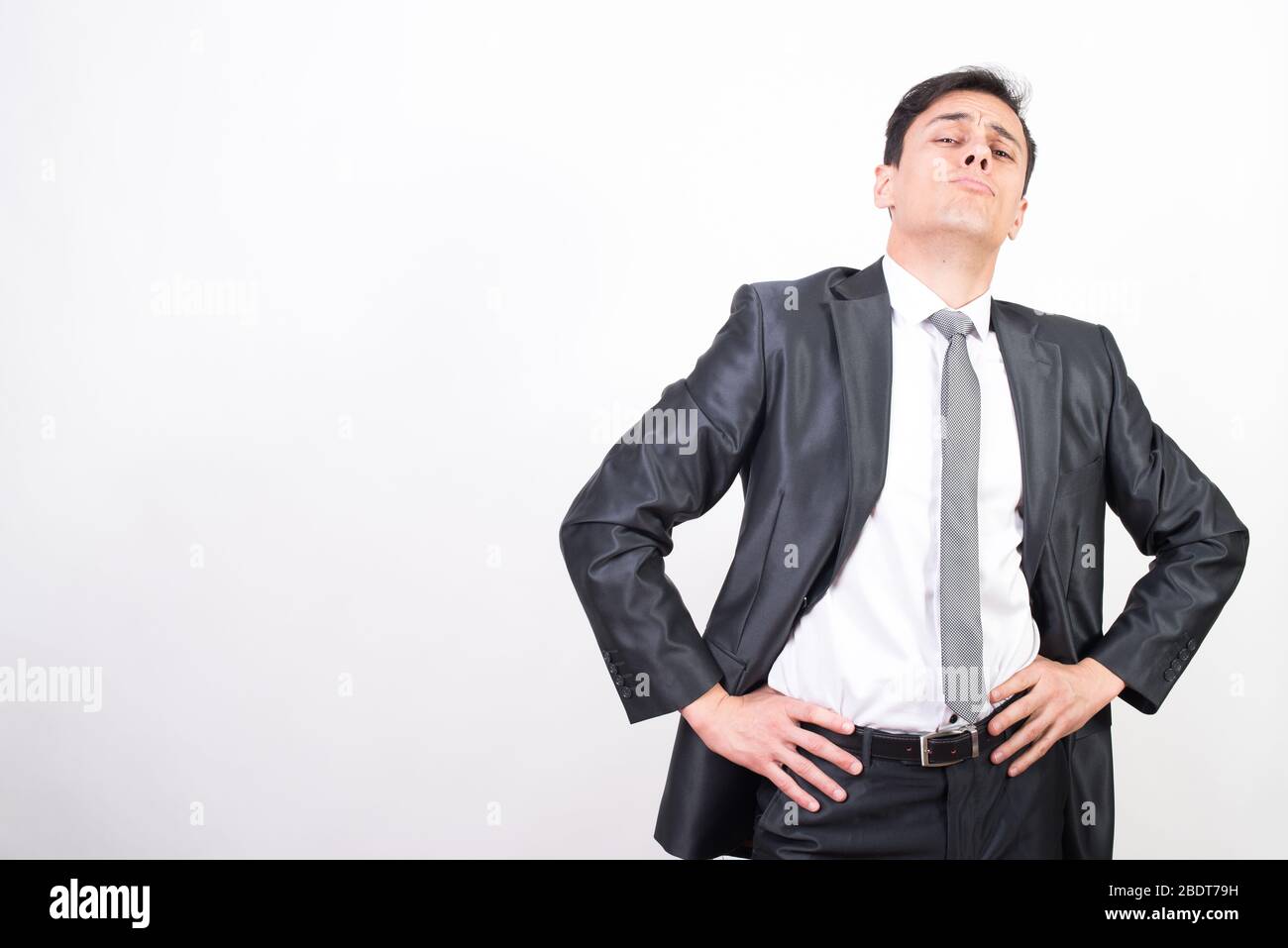 arrogant man in suit white background medium shot stock photo alamy https www alamy com arrogant man in suit white background medium shot image352730493 html