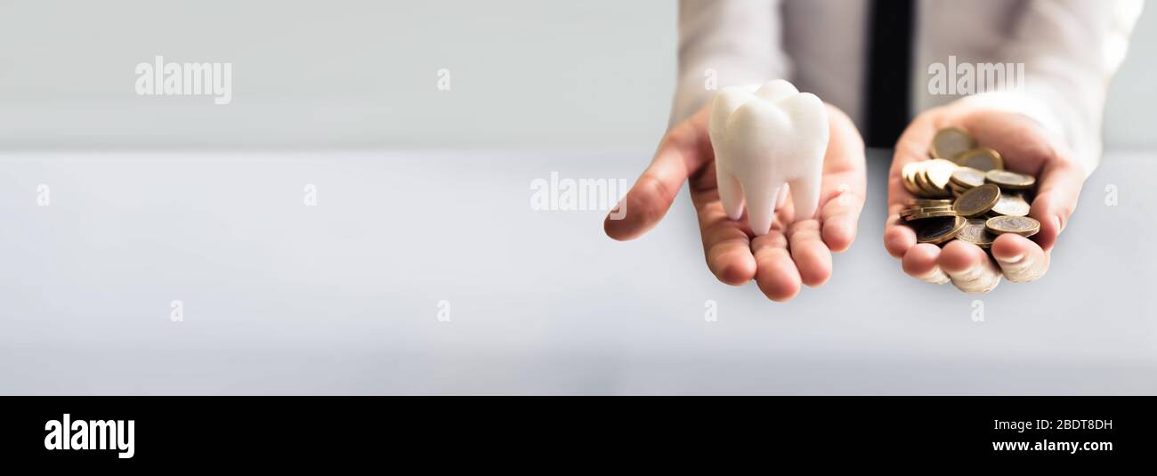 Dental Implant Money And Tooth Insurance Cost Stock Photo Alamy