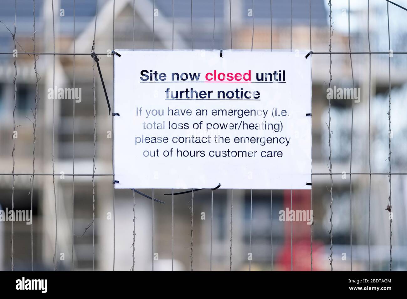 Construction site closed until further notice due to coronavirus uk Stock Photo