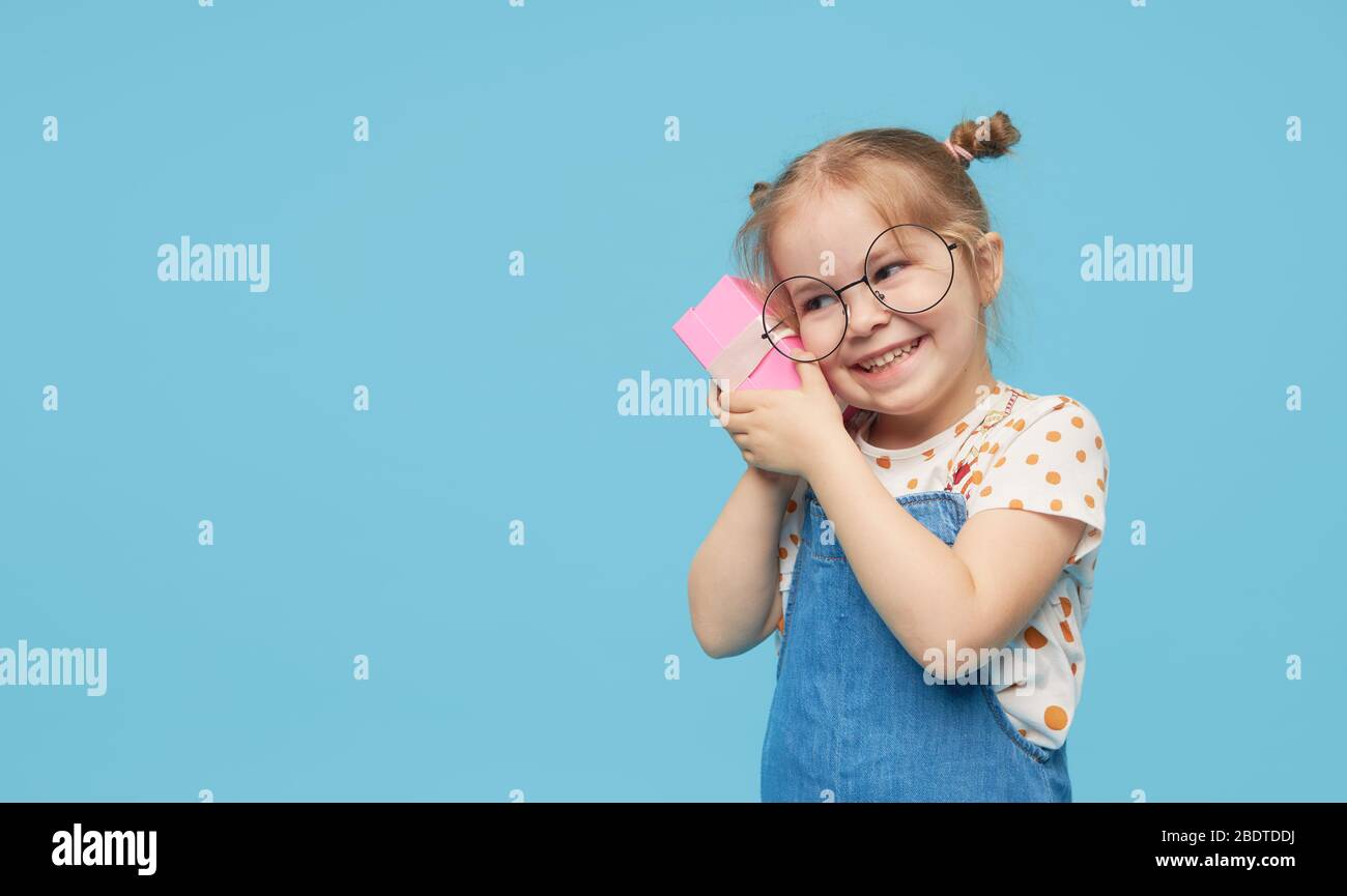 Portrait of surprised cute little toddler girl child standing isolated ...