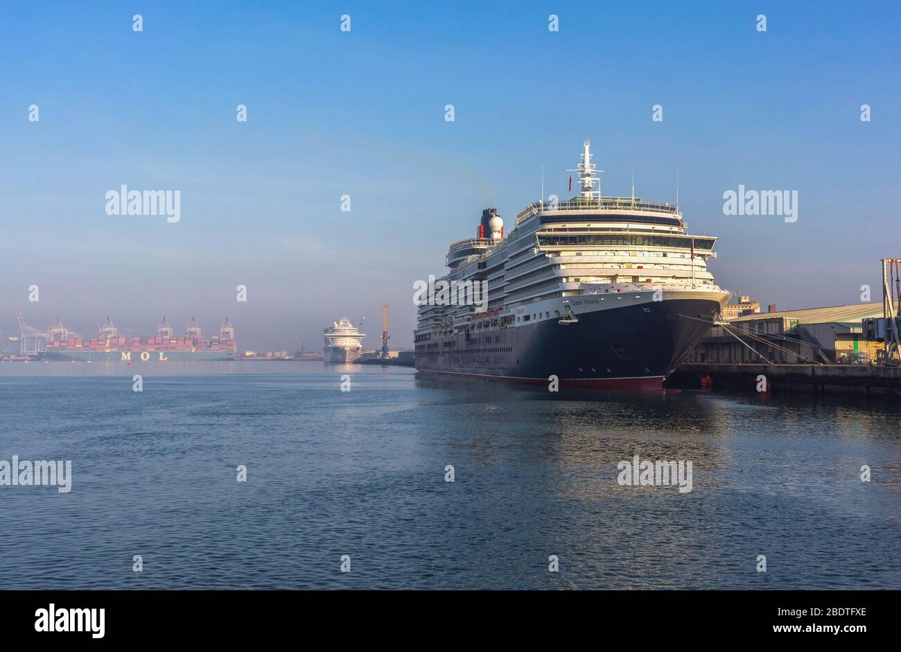 The Queen Victoria cruise ship one of Cunard's flagship liner docked at Southampton City Cruise Terminal Berth 101 during the Coronavirus lockdown unable to be in operation due to the ongoing Covid-19 pandemic in 2020, Southampton, England, UK Stock Photo