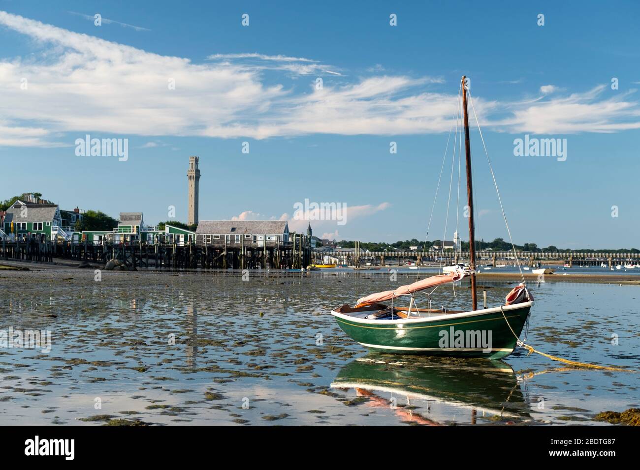 Dory at low tide in Provinetown Harbor on Cape Cod Stock Photo