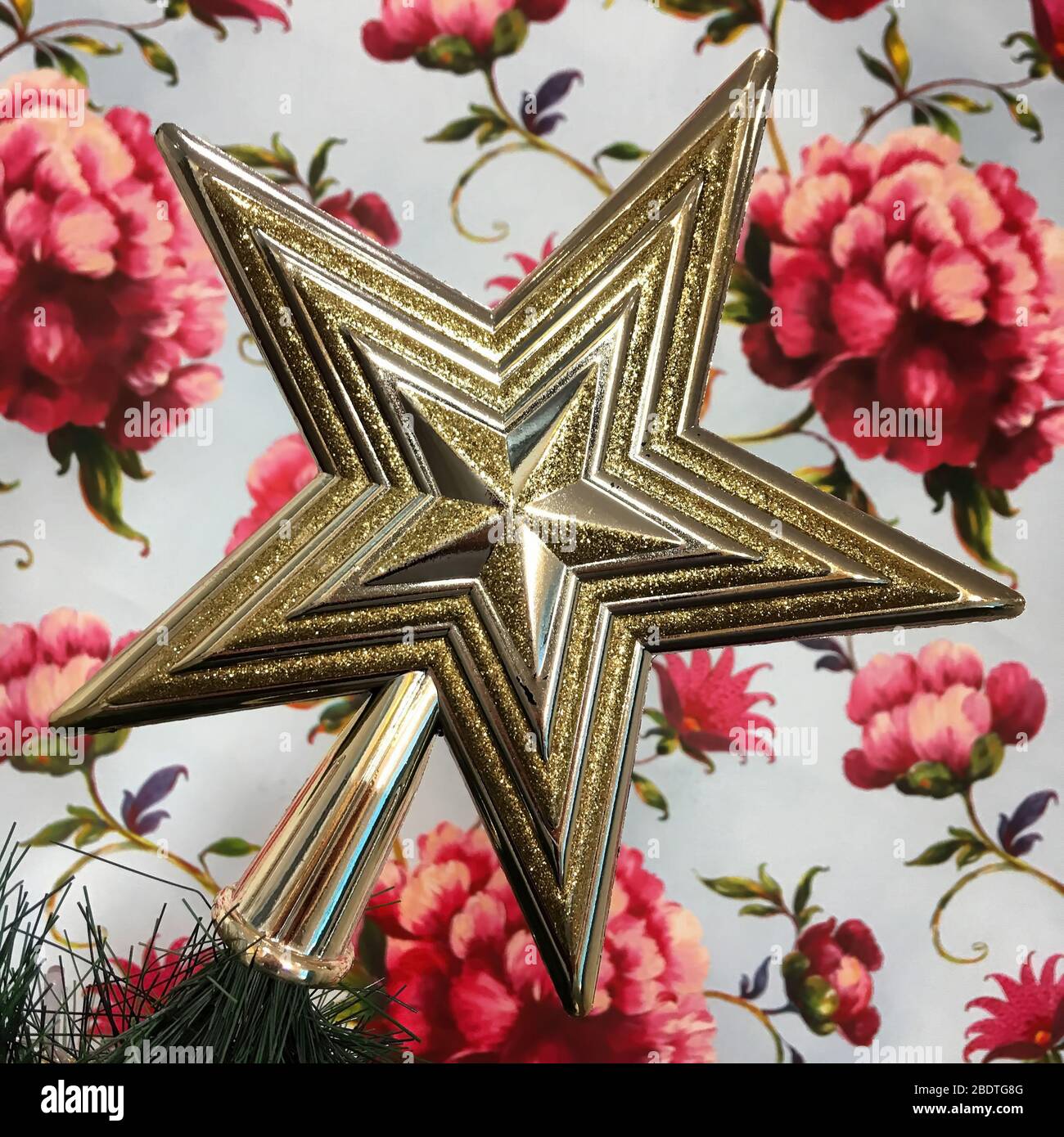 Beautiful star at the top of christmas tree Stock Photo Alamy