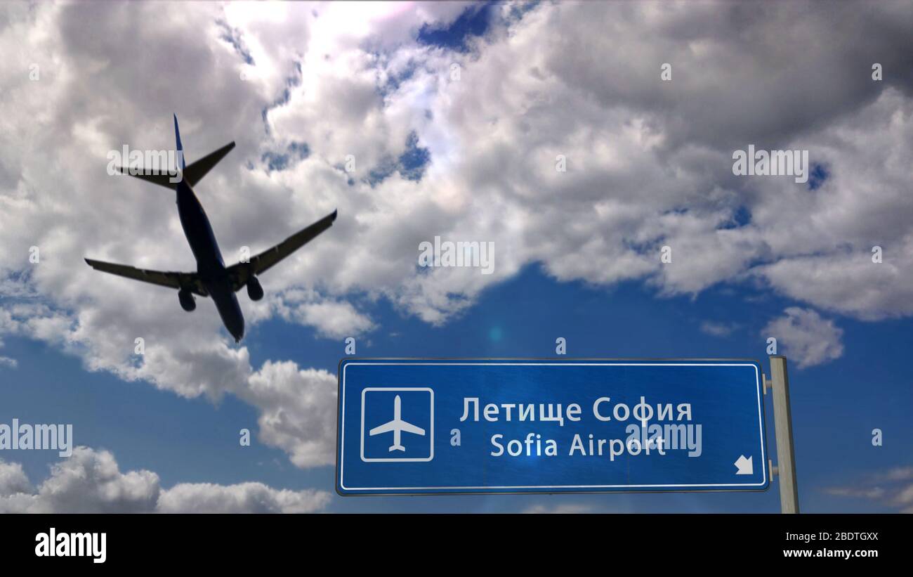 Airplane silhouette landing in Sofia, Bulgaria. City arrival with international airport direction signboard and blue sky in background. Travel, trip a Stock Photo
