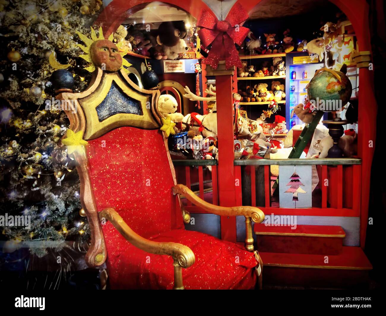 The pretty red santa claus armchair during the christmas holidays Stock