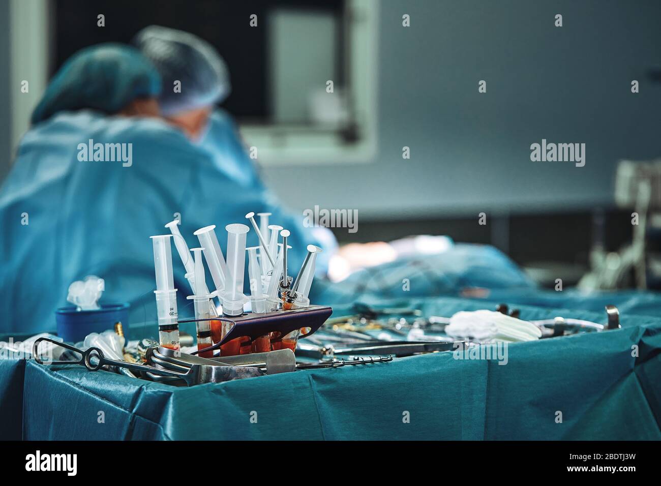 Surgical instruments in the operating room, laid out on a sterile table