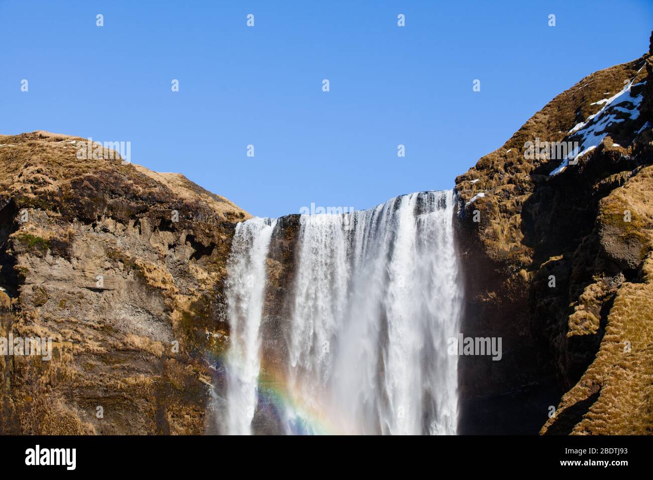 Skogafoss waterfall in south west Iceland with a rainbow Stock Photo
