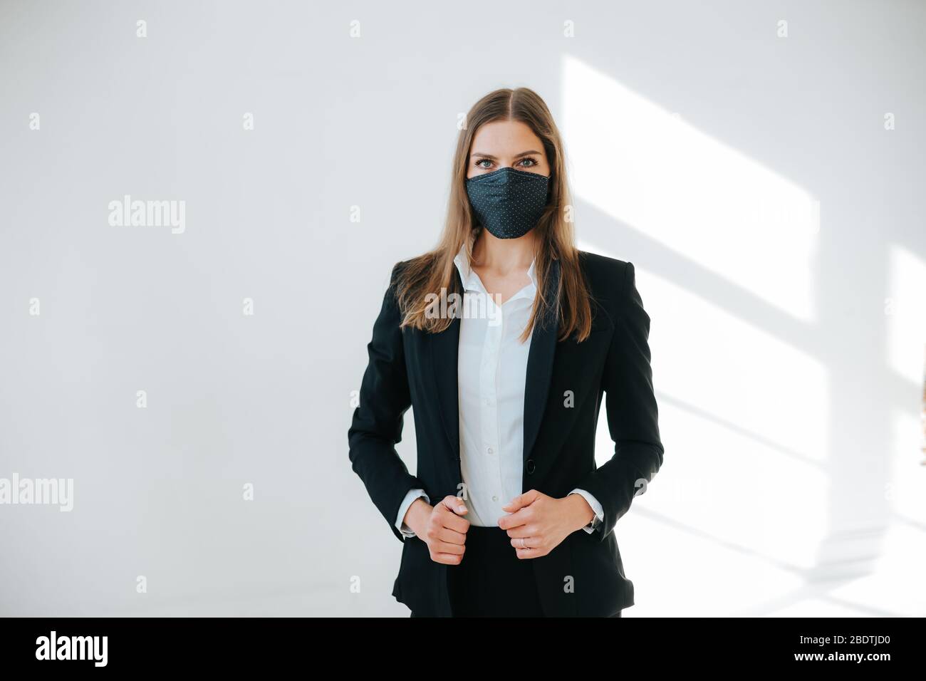 photo of successful business woman wearing a breathing mask Stock Photo