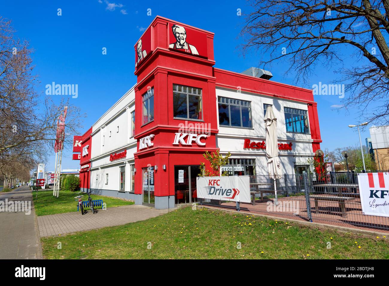 HANOVER / GERMANY - APRIL 7, 2020: Kentucky Fried Chicken logo on a KFC branch in Hanover, Germany. Stock Photo