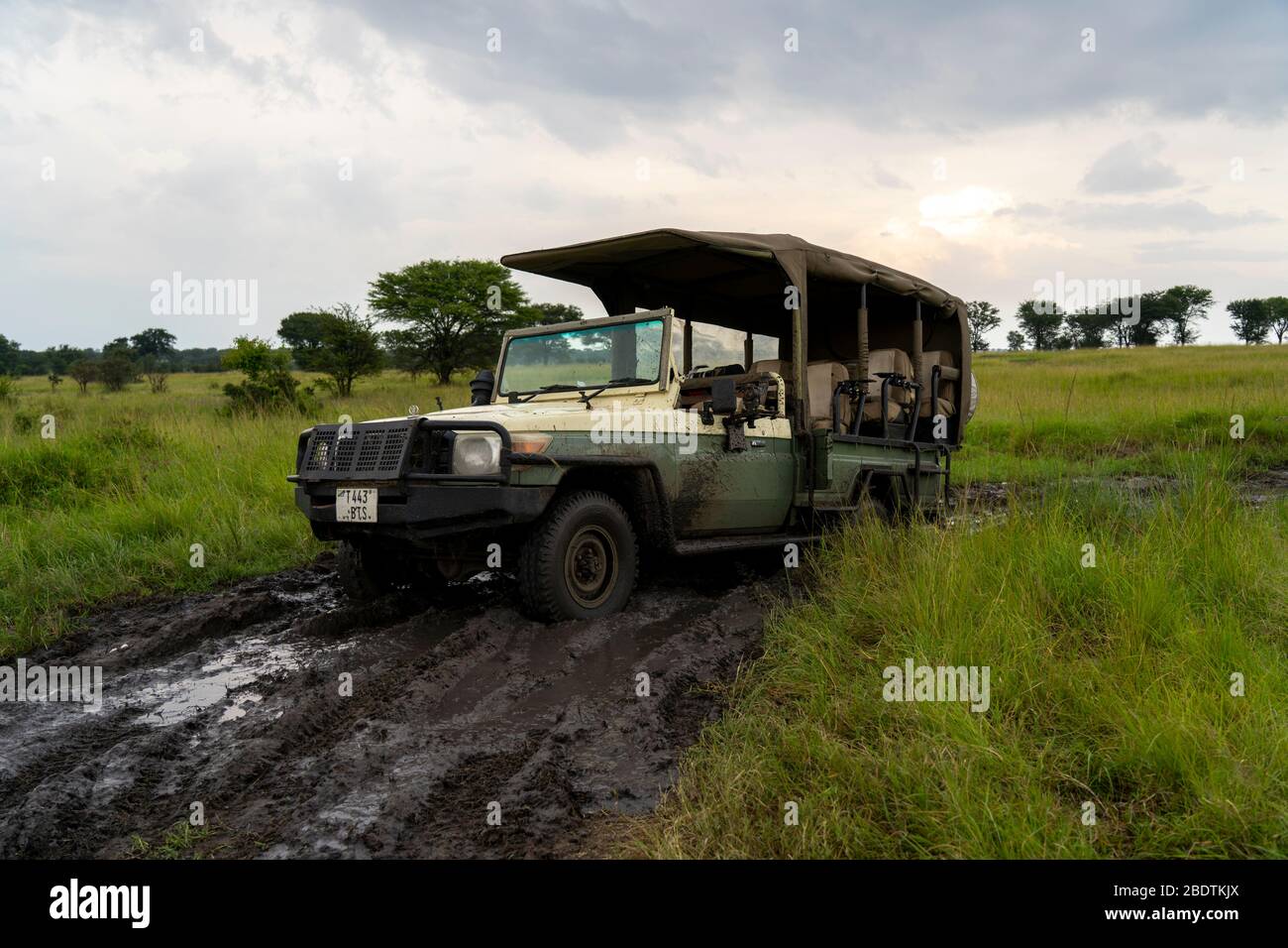safari jeep stuck in mud during rainy season Stock Photo