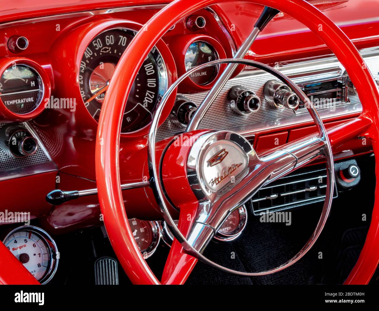 A dashboard Detail of a 1957 Chevrolet Bel Air Stock Photo