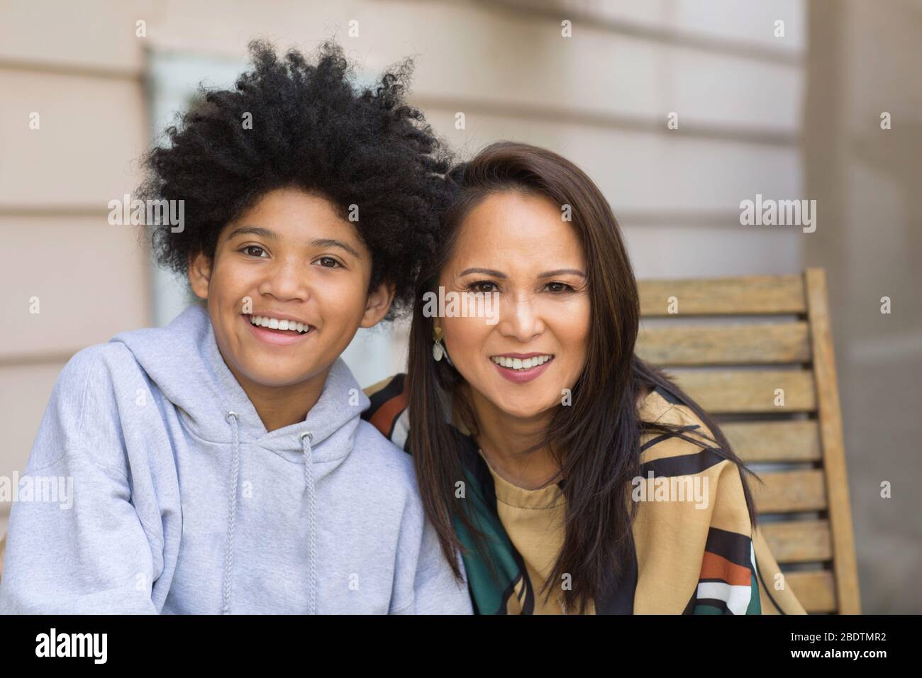 Portrait of an Asian mother with her teenage son. Stock Photo