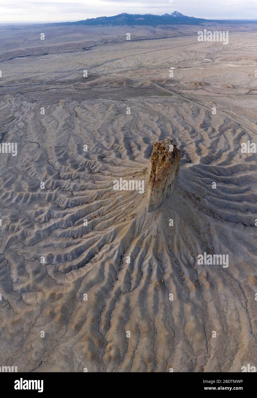 Erosion Cuts Deep Lines in the Earth Surround the Chimney Rock M Stock Photo