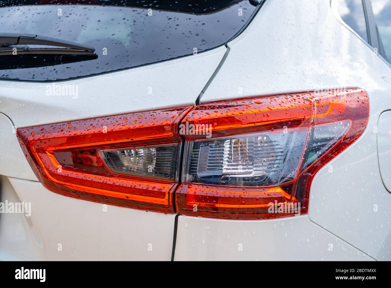 Detail of rear light on a modern white car Stock Photo Alamy