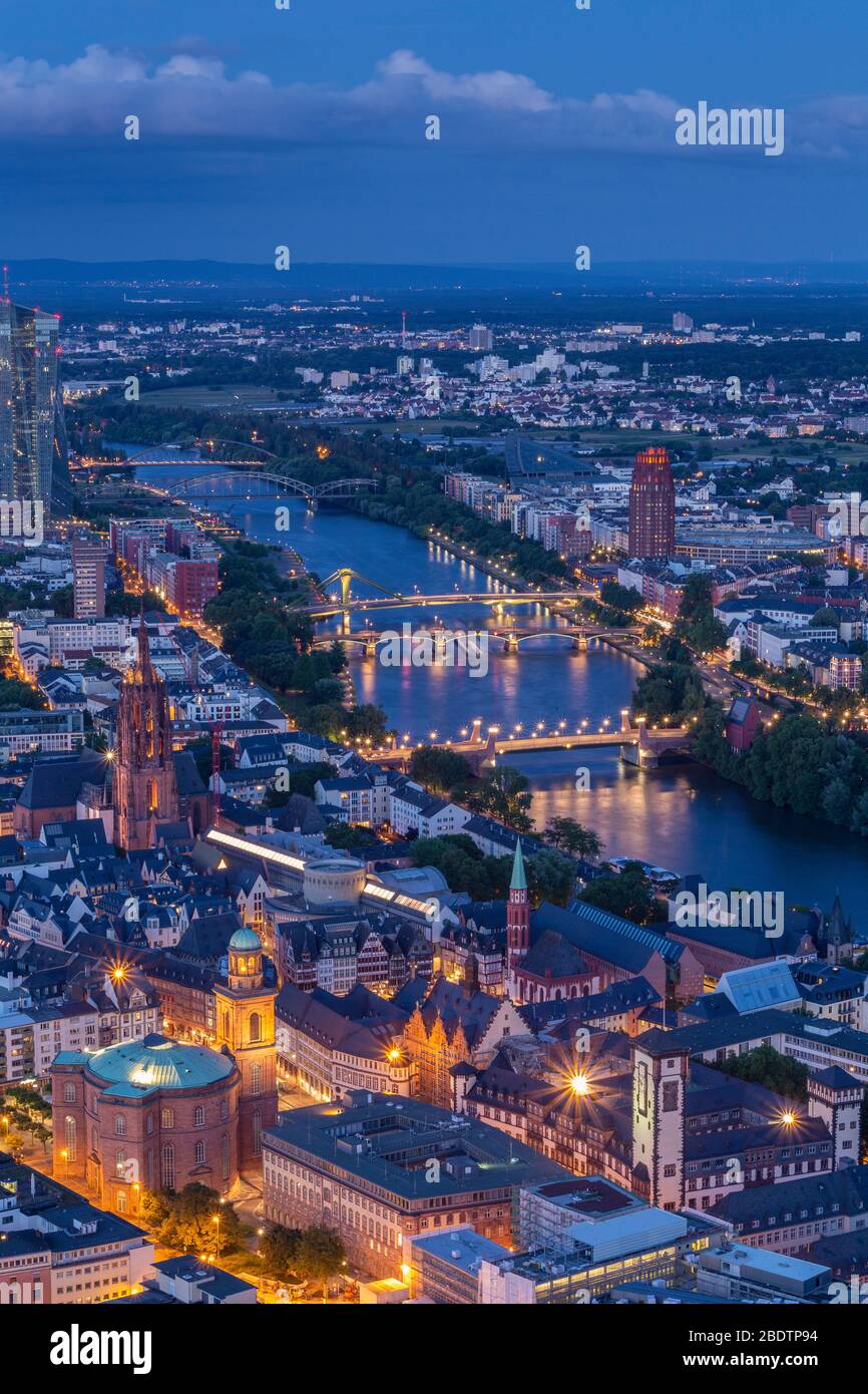 Frankfurt city view from Main Tower showing the river Main, Cathedral, St Pauls church and city streets at dusk Stock Photo
