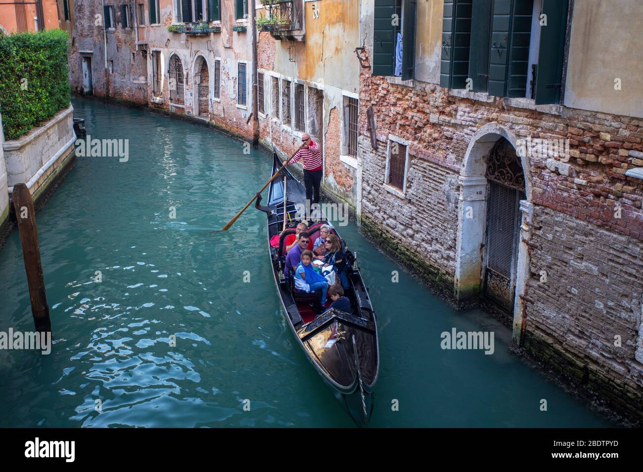 Gondola on a venetian canal hi-res stock photography and images - Alamy