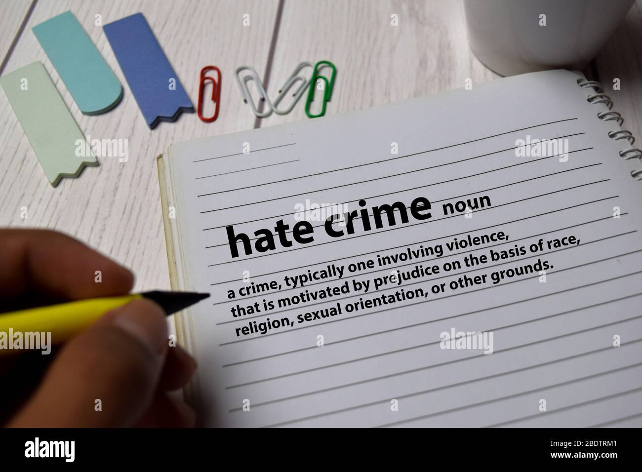 Definition of Hate Crime word with a meaning on a book. dictionary concept  Stock Photo - Alamy