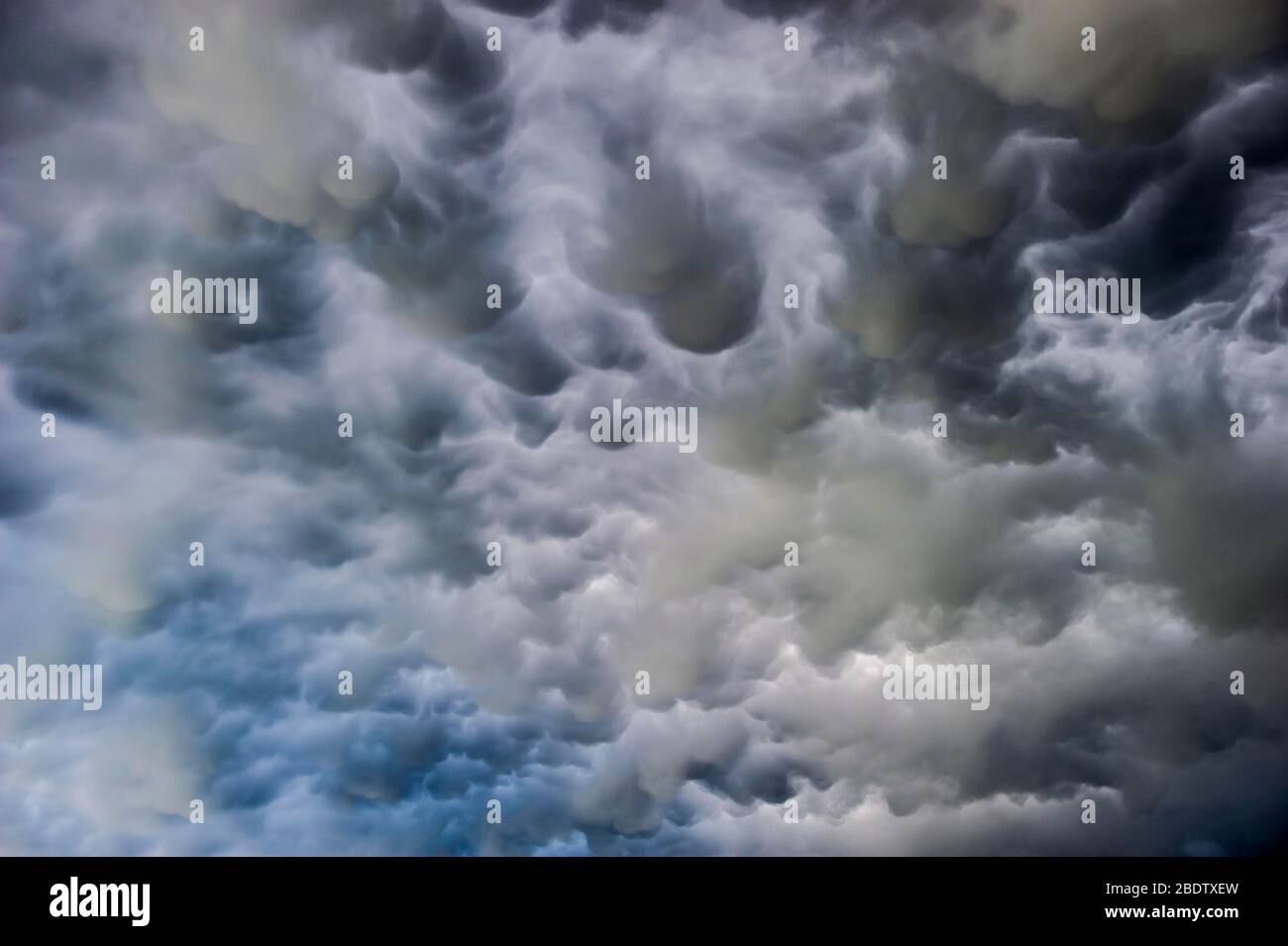 Mammatus clouds, dramatic cloud atmosphere, thunderclouds, cumulonimbus, Germany Stock Photo