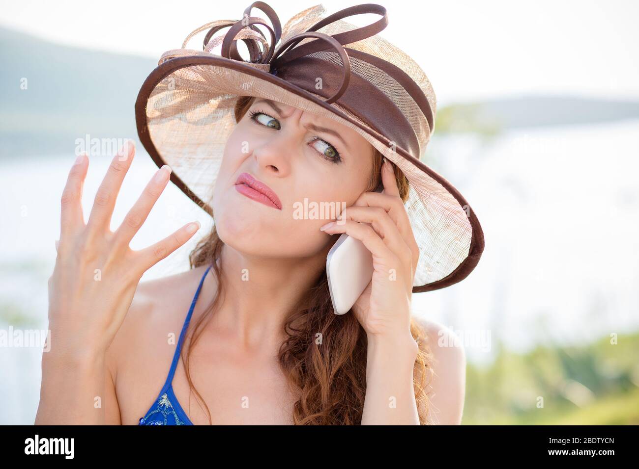 Angry young woman raising hand hi-res stock photography and images - Alamy