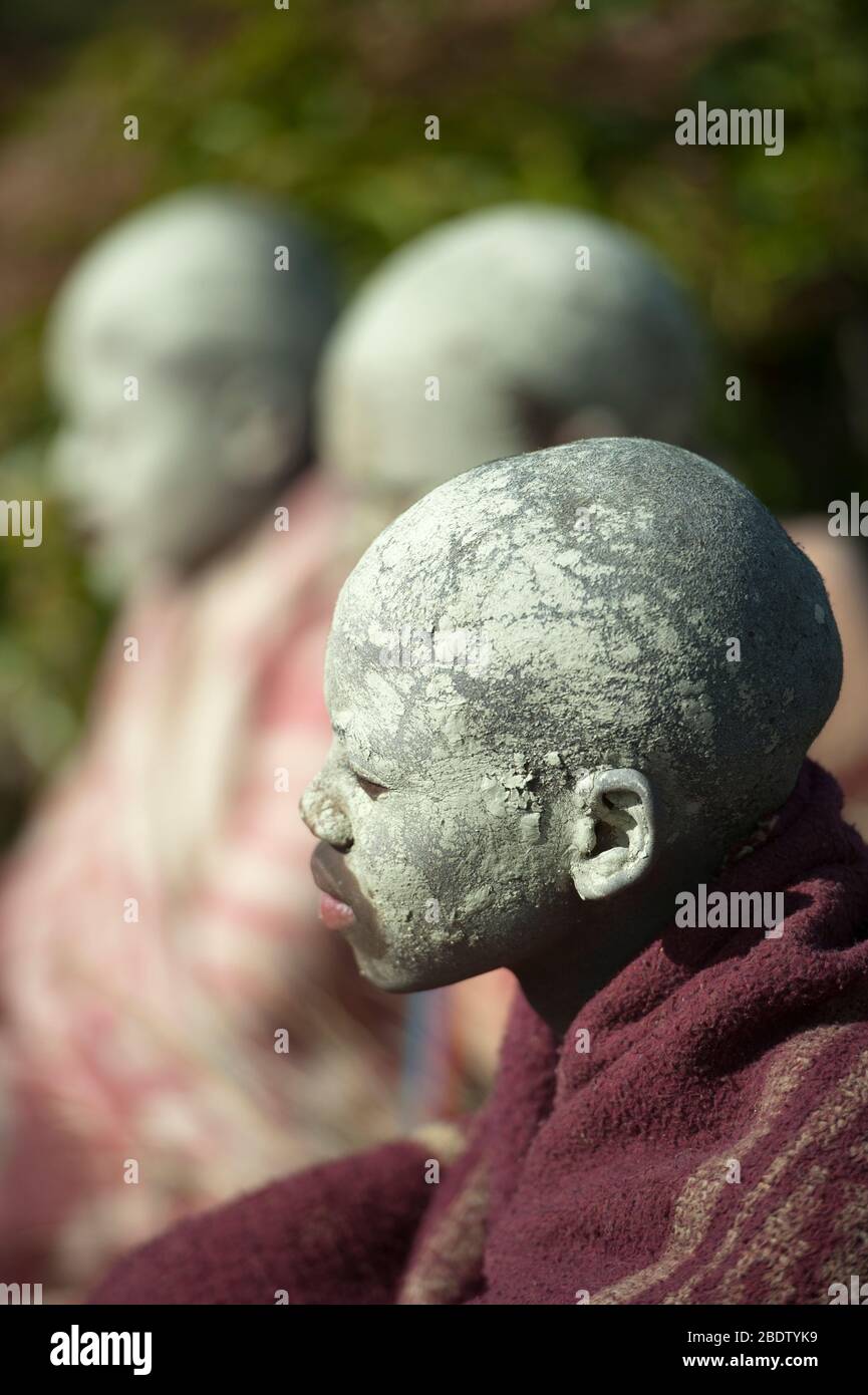 AmaPondo Xhosa boys with white clay, I-Futa, on faces who have just been circumcised, uku-Lukwa, Umzimvubu Valley, Mkanzeni, Pondoland, Eastern Cape Stock Photo