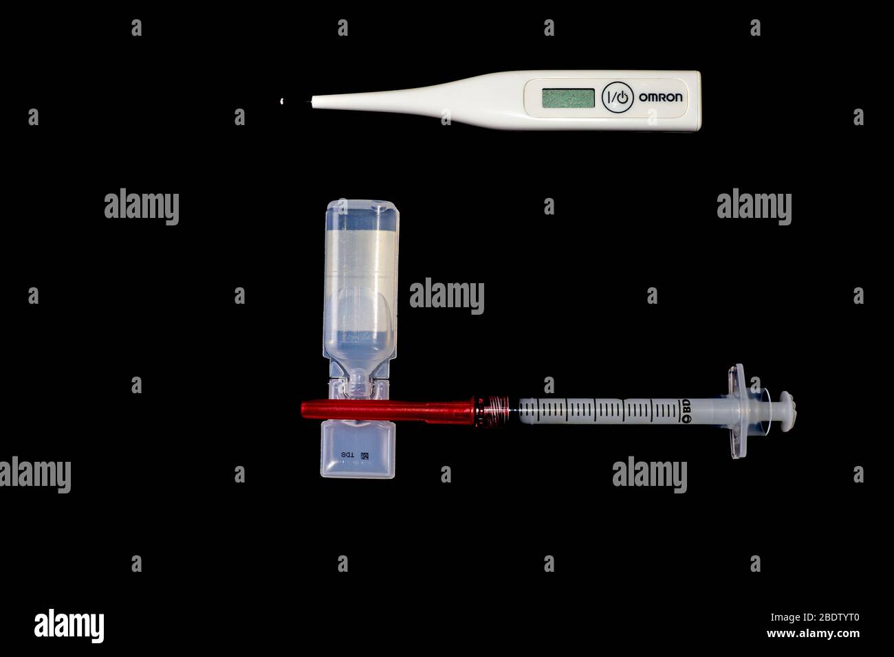 Thermometer, Syringe and Solution Stock Photo