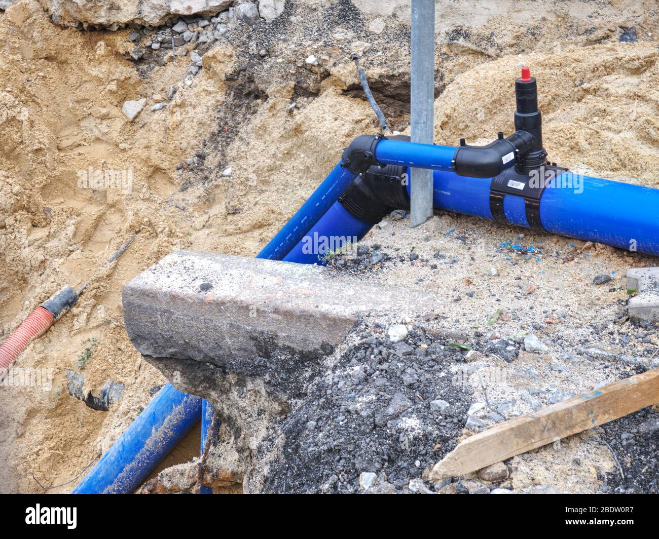 Three way joint of the PVC pipe. Potable water delivery system under