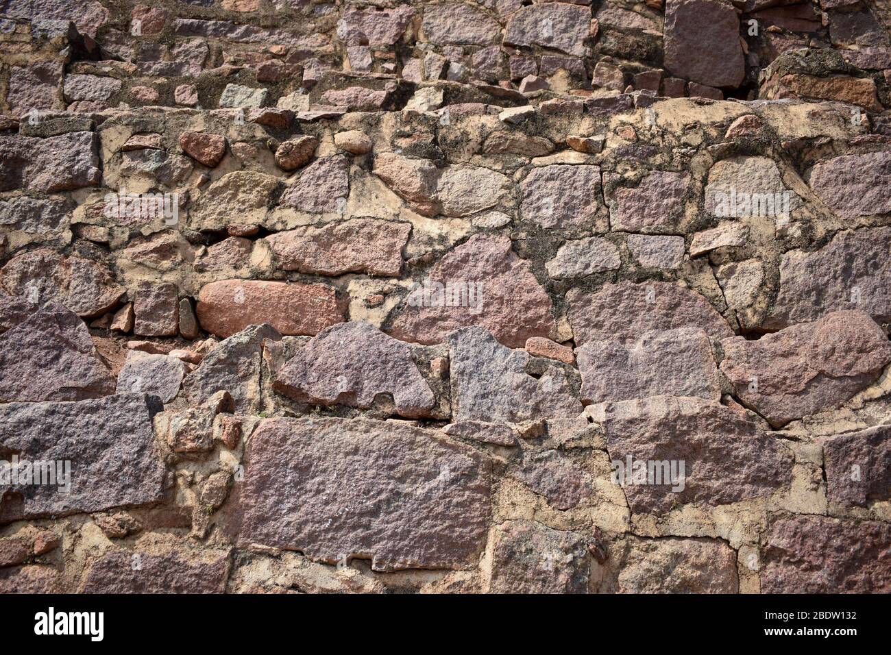 Concrete block bricks in stack for wall construction. Dirty Old Texture Stock Photo