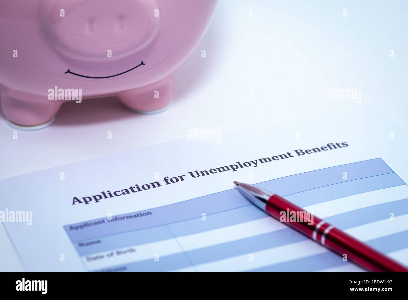 Filling out an online unemployment benefits application form. stock photo Application Form, Unemployment Benefits, A Helping Hand, Adult, Adults Stock Photo