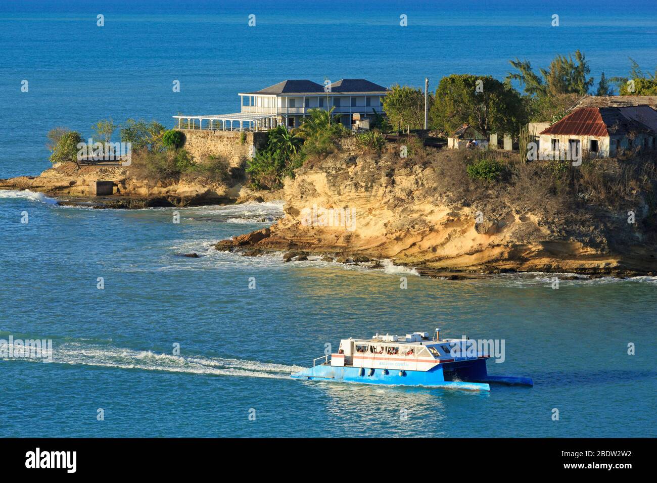 Ferry passing Fort James in St. John s Antigua Island Antigua