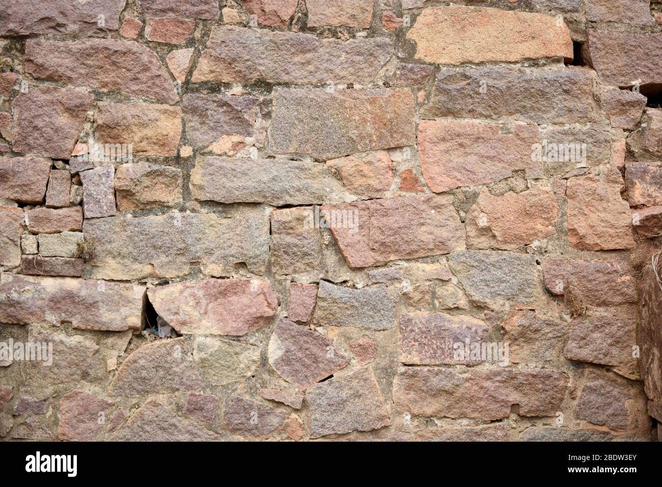 Pattern of Rough Grunge Vintage Stone Wall Texture Background.Dirty Old Texture Stock Photo