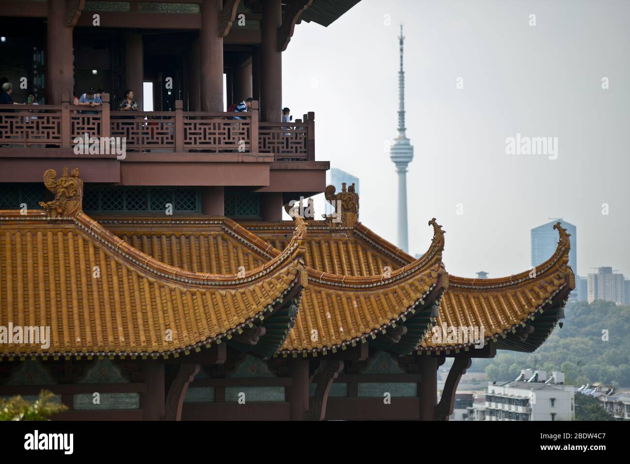 Yellow Crane Tower: details on the architecture with the TV Tower on the background. Wuhan, China Stock Photo
