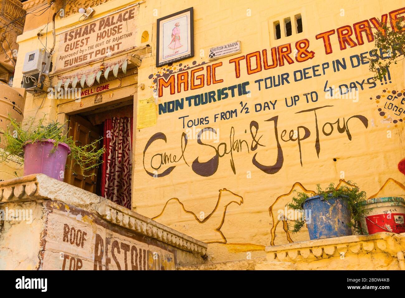Guest house with camel safari sign Jaisalmer Fort Rajasthan India Stock