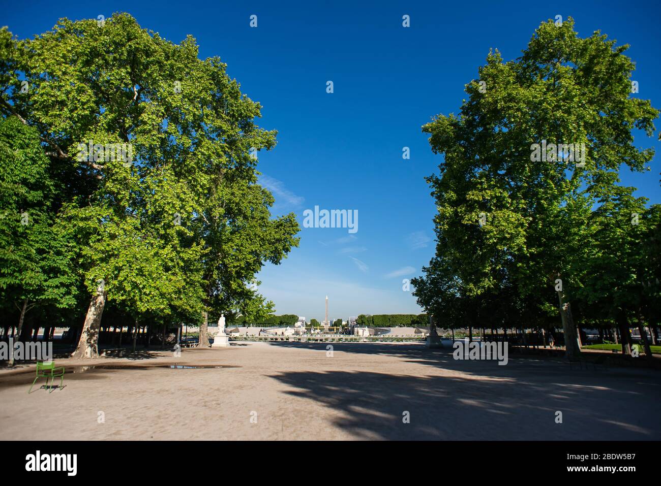 Tuileries Garden with Luxor Obelisks on Background in a Sunny Spring Day in Paris. France. Stock Photo