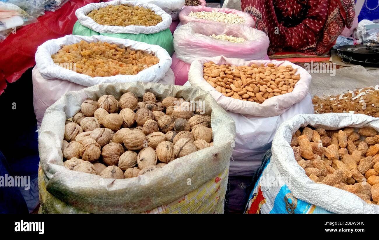 Selling Dry fruits at street market in Old Delhi, India Stock Photo Alamy