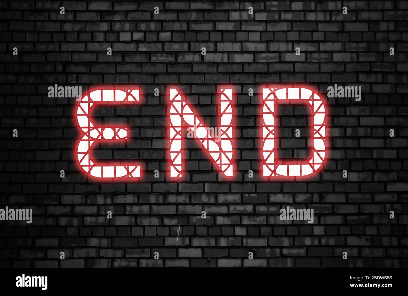 End word glowing in pink neon on a dark brick wall background. Ending