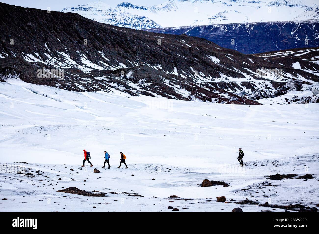 Tourists hiking on a glacier hike on Svinafellsjokull glacier an outlet glacier of Vatnajokull, South Iceland Stock Photo