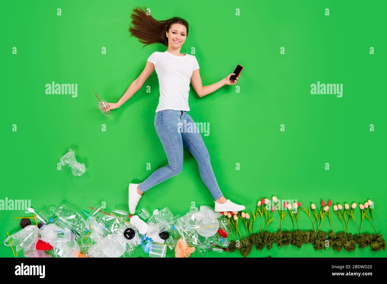 Full size high angle flat lay photo irresponsible citizen lady throw plastic products littering street earth pollution step on flowers mind only Stock Photo