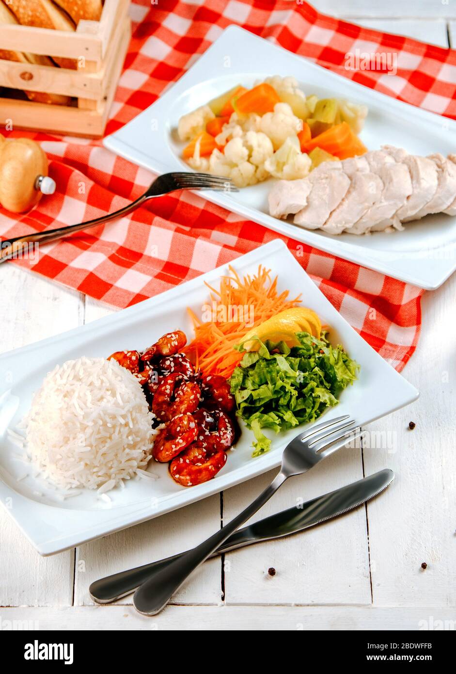 chicken main courses with various garnishes Stock Photo - Alamy