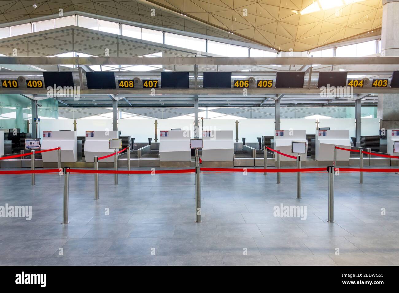 Empty checkin desks for drop off baggage with paths canceled with a