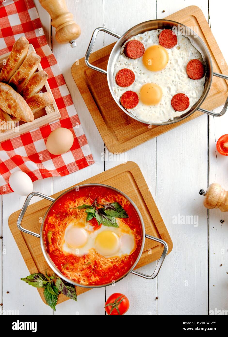 fried sausages with eggs on the table Stock Photo